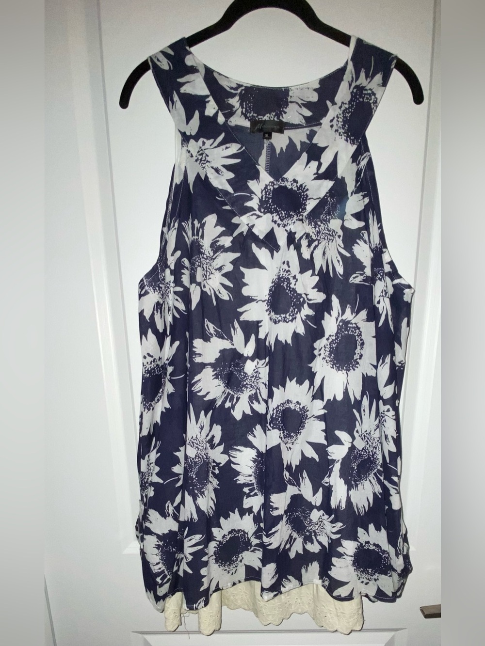 Woman’s Floral Print Navy and White Sleeveless flowing top